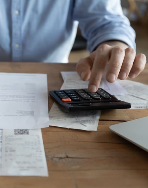 Man Calculating Expenses - Business Consultant in Australia